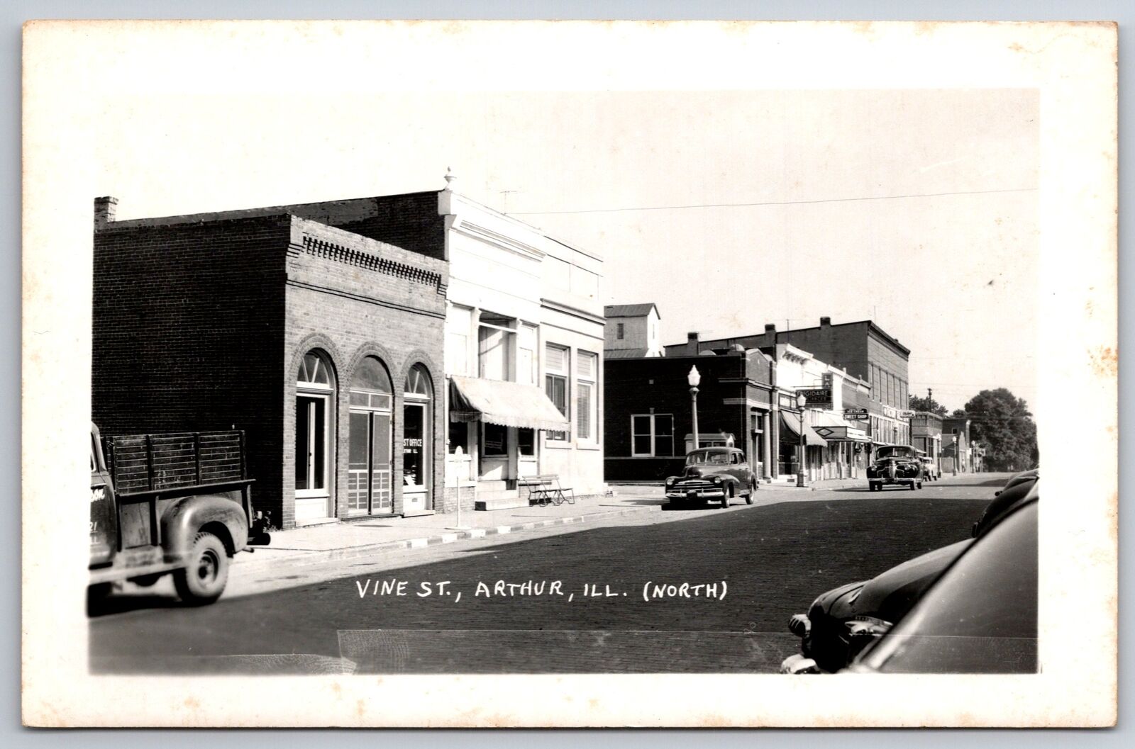 Arthur Illinois~Post Office~Frigidaire Appliances~Sweet Shop~1947 Dhevy~RPPC