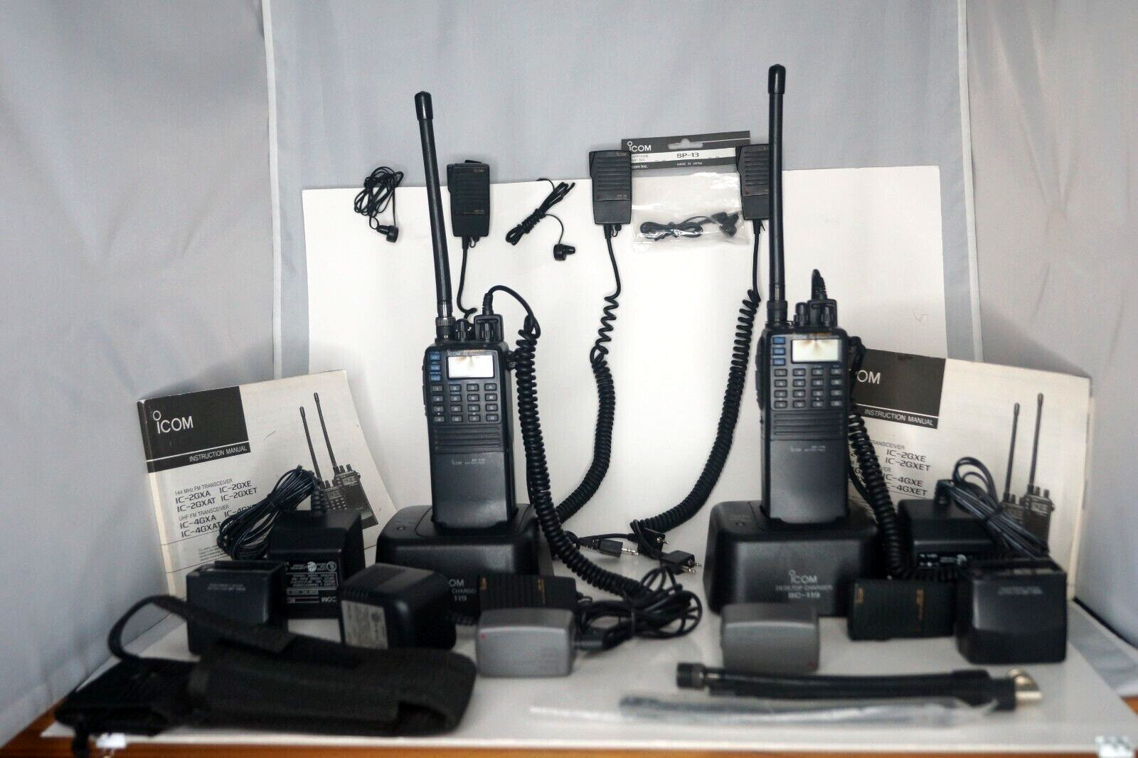 Complete ICOM IC-2GXAT FM Transceiver Set - with chargers. manuals, and extras
