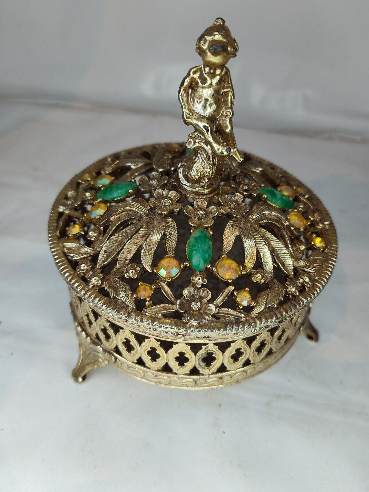 Vtg. Goldtone Filgree footed Rhinestone metal Cherub lid Trinket/Vanity box
