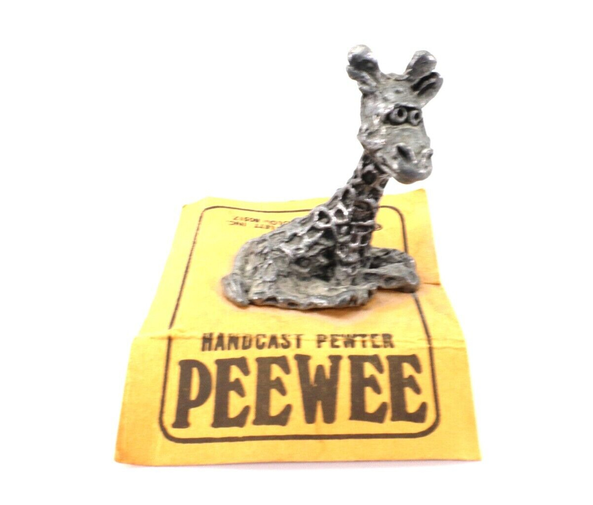 Handcast Pewter Mini Figurine PEEWEE GIRAFFE Baby Sitting on Paper 1972 Vintage