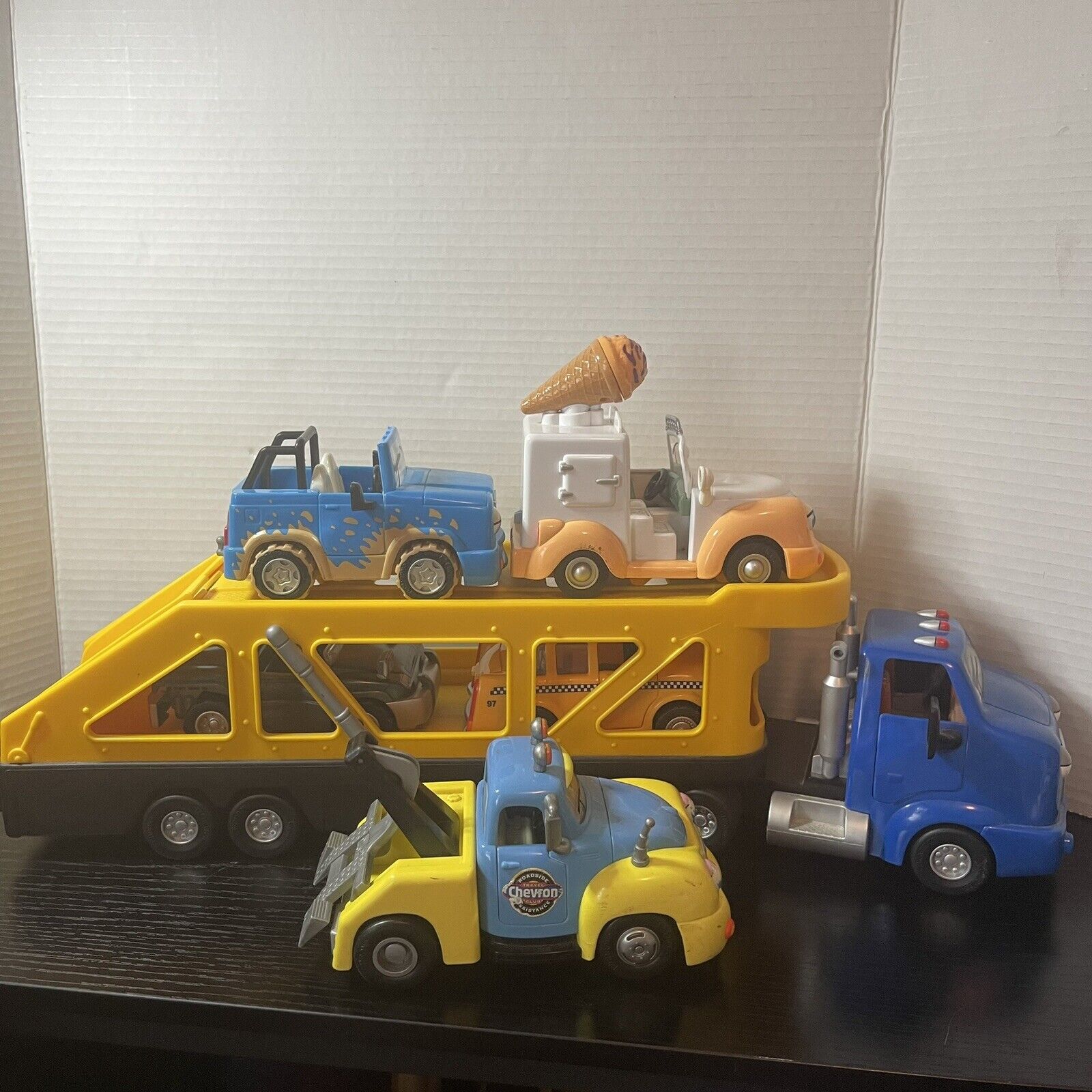 Chevron Cars Carrier No 14 Semi Truck and Trailer with 4 Vehicles And Tow Truck