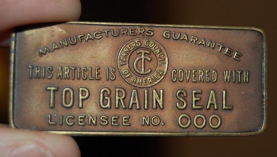 RARE VINTAGE TOP GRAIN SEAL TANNERS COUNCIL OF AMERICA  BRASS ADVERTISING TAG