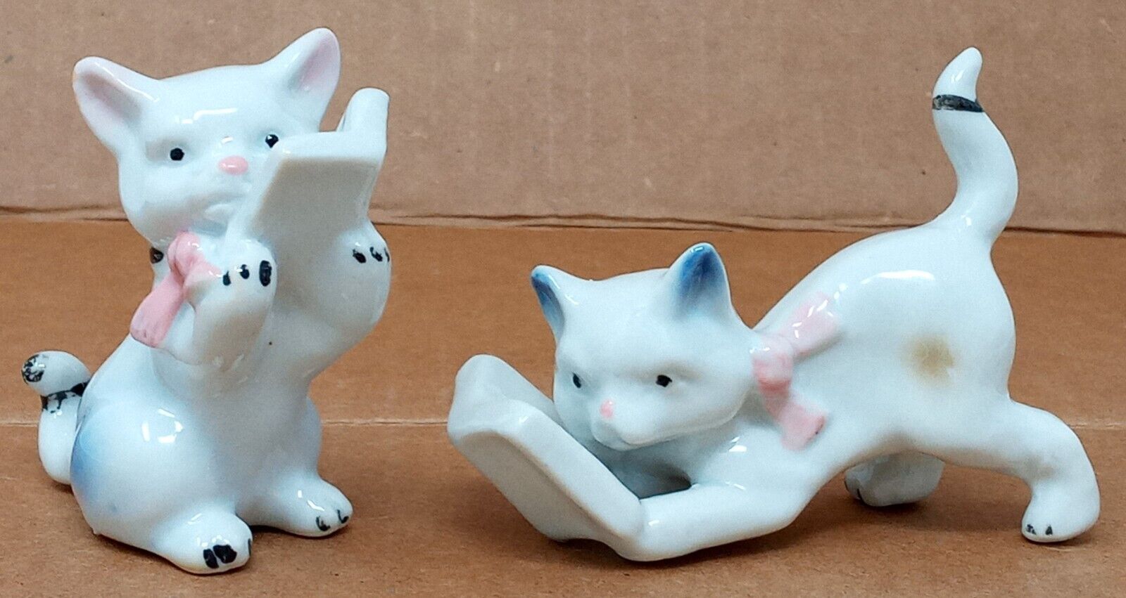 Pair of Porcelain Cat Figurines White w/ Book pink bow 2 & 3 unmarked