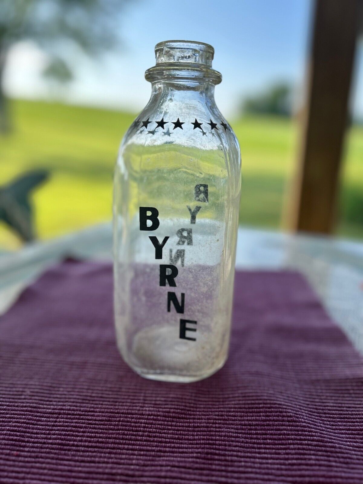 Vintage Byrne Quart Milk Bottle (Black print) With Stars Around Neck