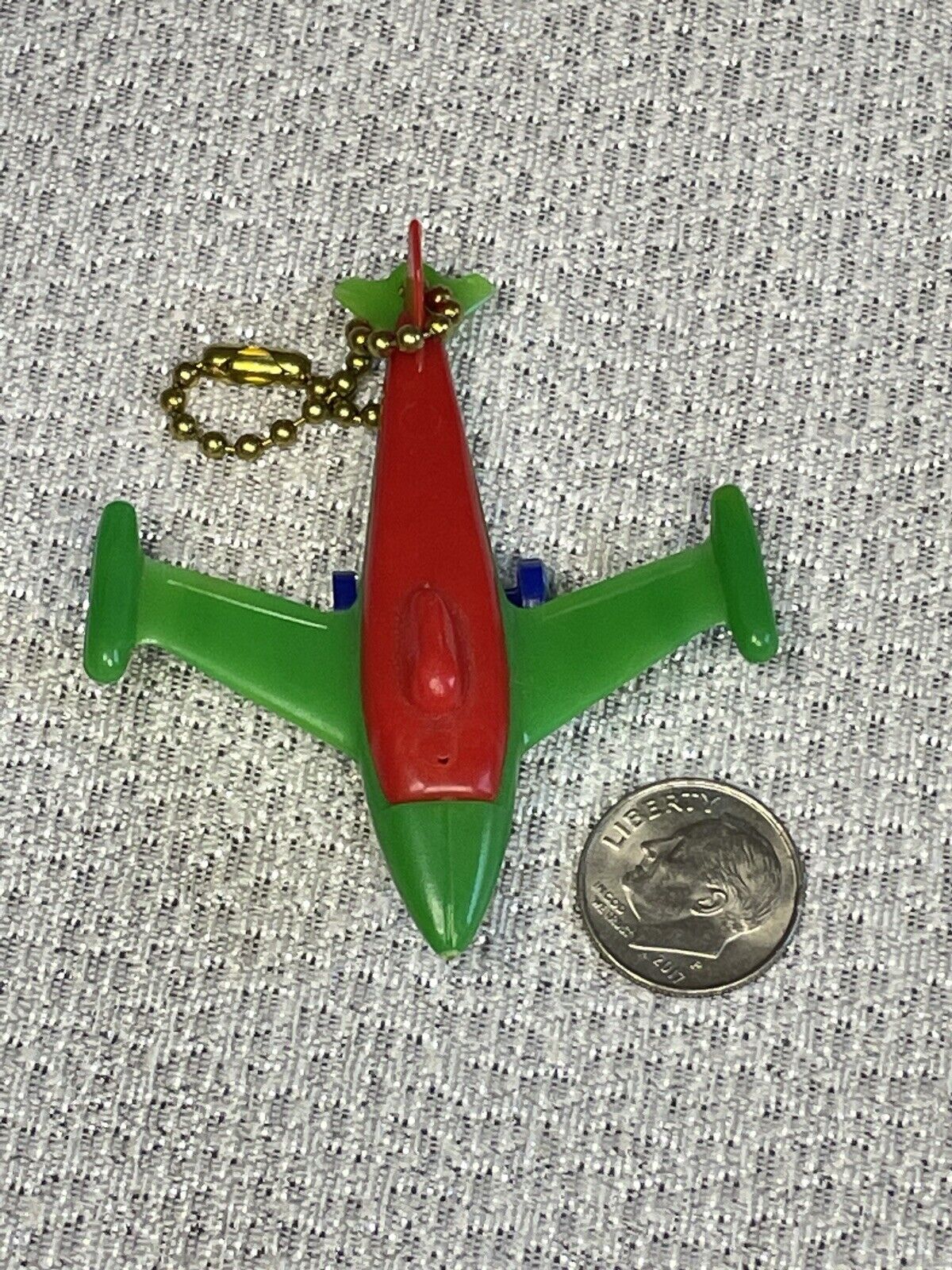 Vintage Toy Rocket or Jet Plane 5 Color Plastic Puzzle Key Chain