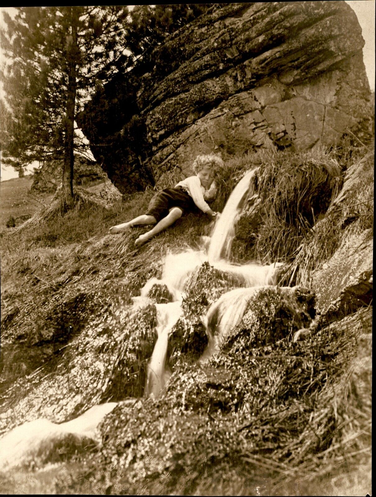 GA125 Orig Underwood Photo LITTLE BOY PLAYING Swiss Countryside Mountain Stream