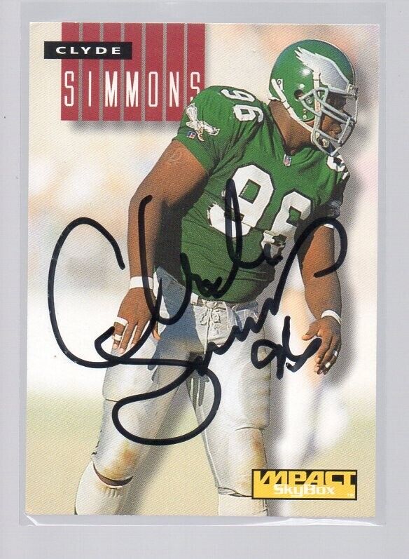 CLYDE SIMMONS AUTOGRAPHED FOOTBALL CARD