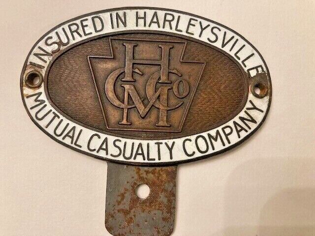 Vintage Harleysville Mutual Casualty License Plate Topper Metal White/Gold Rare
