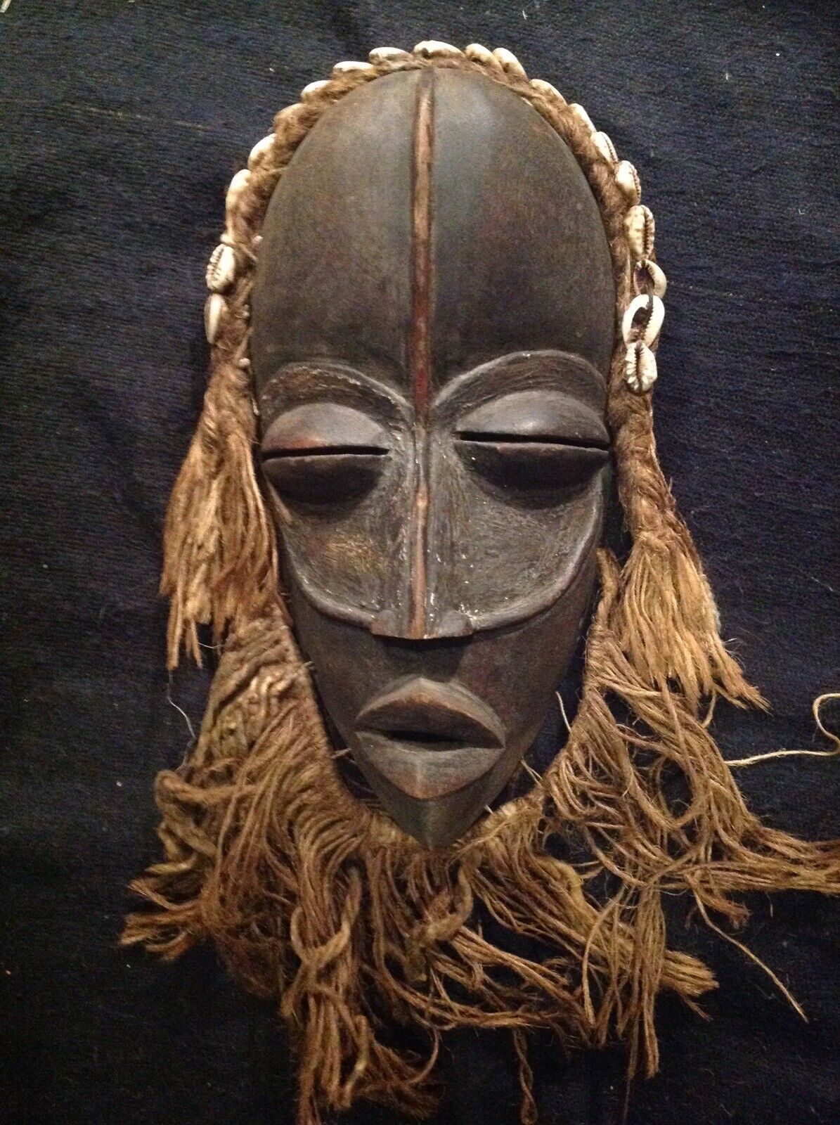African Tribal Dan Mask.  Wood and Cowrie shells. Early 20th C