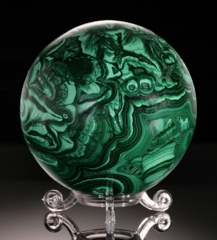 An exceptional sample of malachite in a mesmerizing sphere shape.