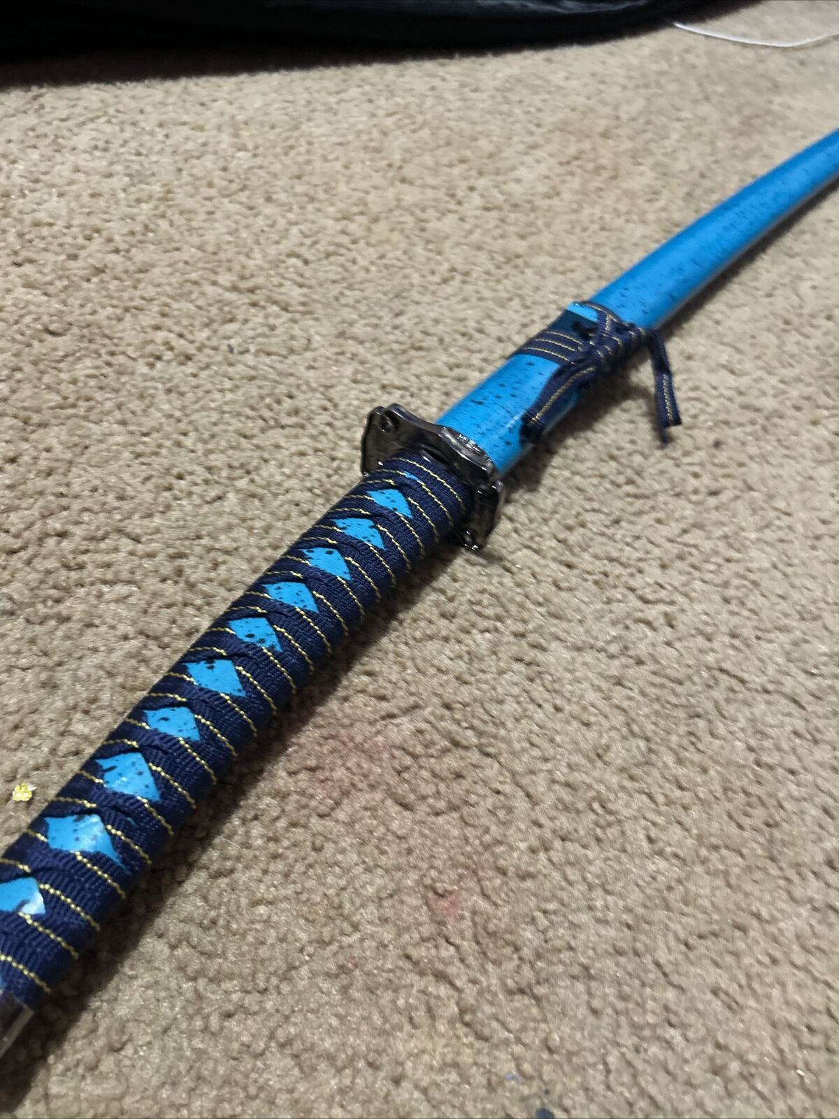 Blue turquoise black spotted sword