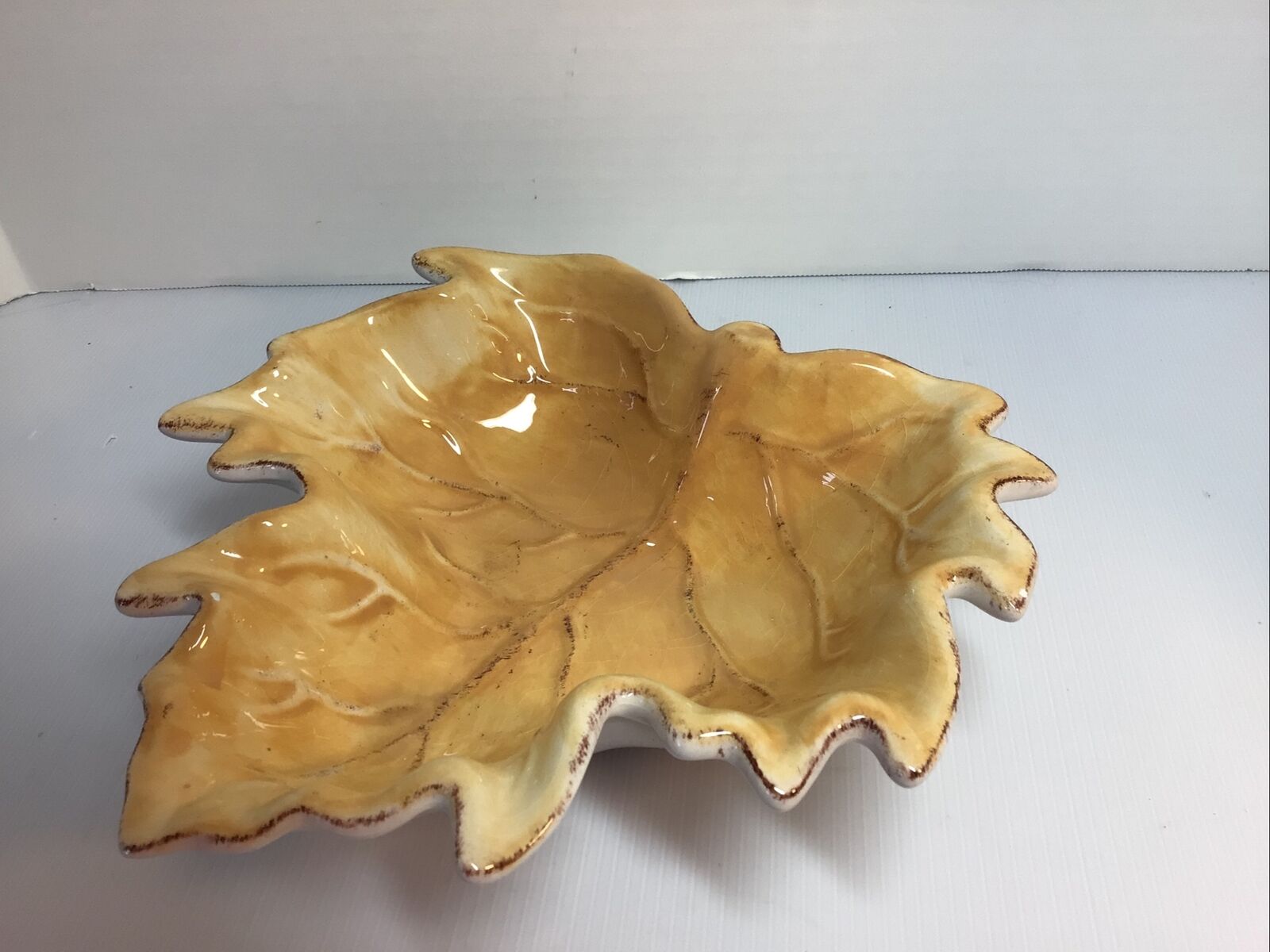 Vintage ceamic leaf, golden color, about 8.5 by 8.5
