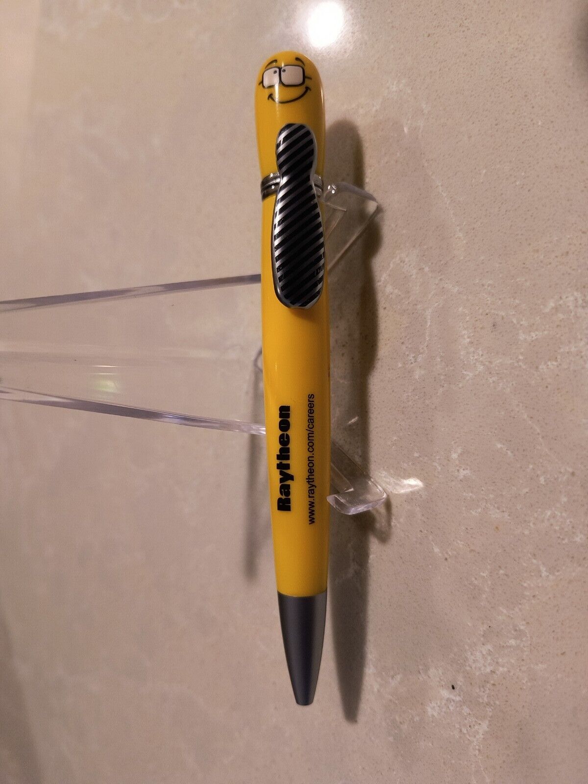 RAYTHEON PEN with black ink, takes standard refills.