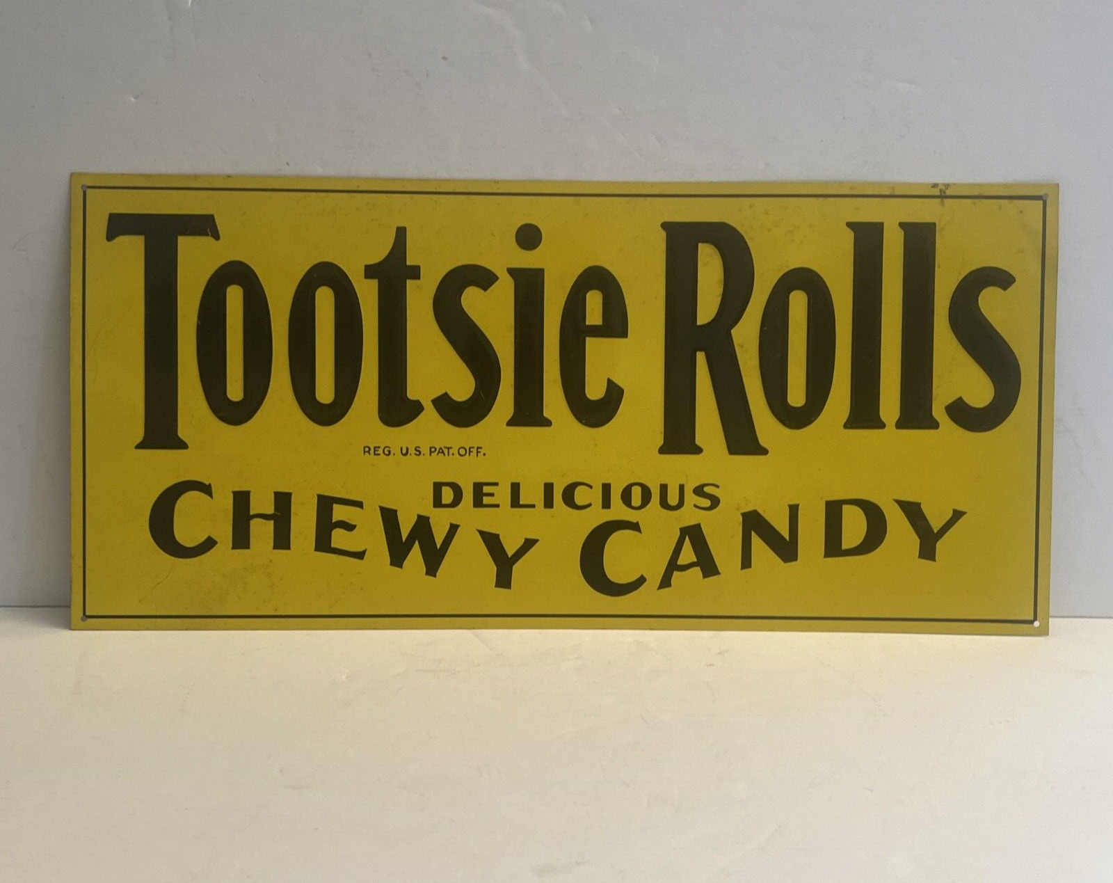 Vintage Tootsie Rolls Chewy Candy Embossed Tin Litho Advertising Sign 20x9 USA