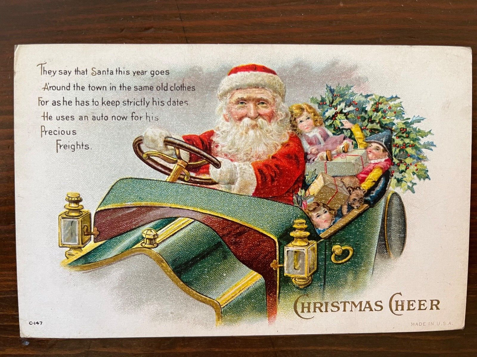 Antique Embossed Postcard Santa Claus Christmas Cheer Driving Car Full of Toys