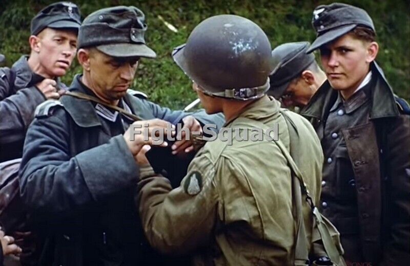 WW2 Picture Photo US Soldier helps a German POW 8359