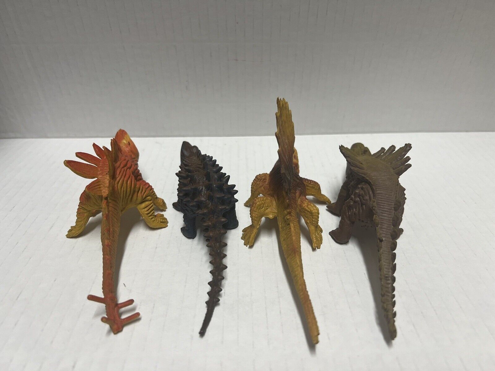 Vintage Dinosaurs Set of 4 Made in Hong Kong Small Ferocious looks