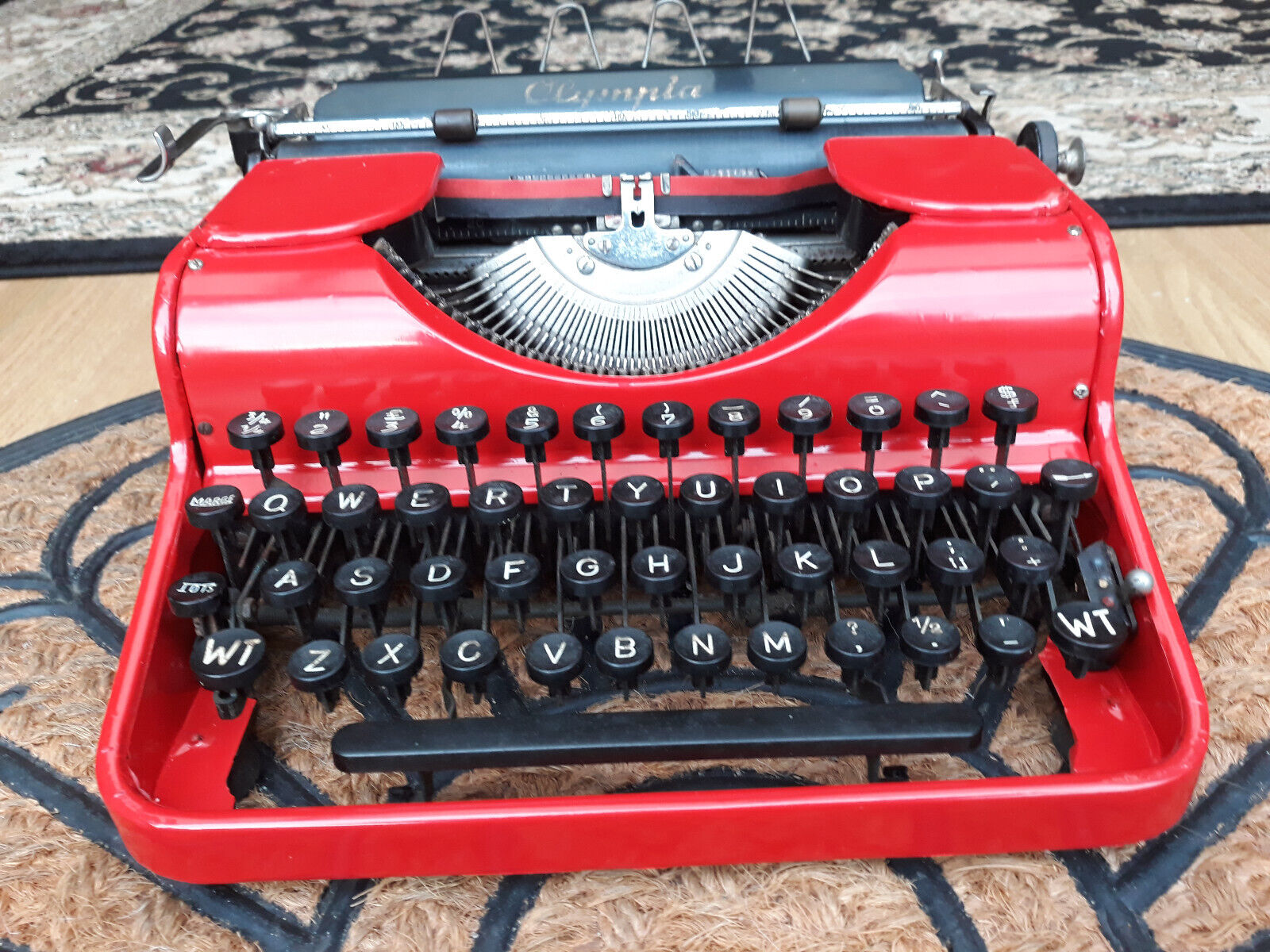 Beautiful red Olympia Progess de luxe portable vintage typewriter with case
