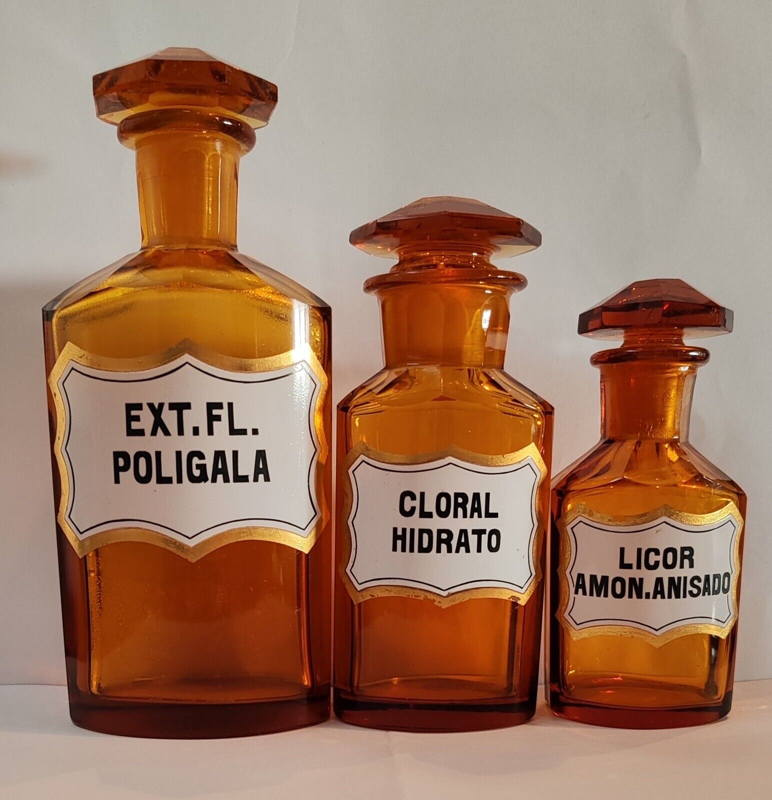 Nice old three amber pharmacy bottles. Crystal glass