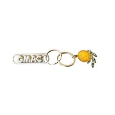 vintage gmac numbered lost key, key chain with dream catcher attachment picture