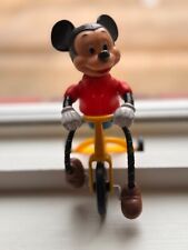 Vintage Mickey Mouse on moving tricycle picture