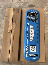 Original NOS International Batteries Thermometer Gas Oil Tires Sign picture