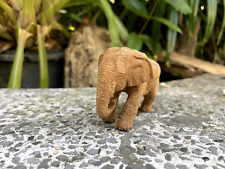 Lifelike carved elephant made from teak wood by handmade picture