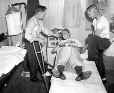 Pete Reiser lights up cigarette for Pee Wee Reese who hurt left el .. Old Photo picture