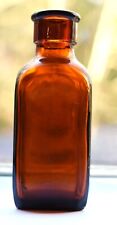 Antique Amber Glass Bottle made by Tibby Brothers Glass picture