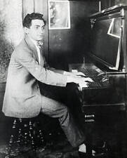 Composer Irving Berlin Is Shown Seated At A Piano Playing Historic Old Photo picture