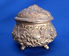 ART NOVEAU ROUND GILDED METAL JEWEL / TRINKET BOX.  RAISED RELIEF FLORAL  ON LID picture
