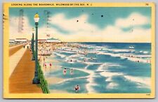 Looking Along Boardwalk Wildwood By Sea NJ New Jersey Linen Postcard PM Cancel picture