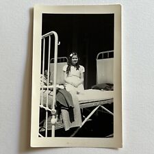 Vintage B&W Snapshot Photograph Adorable Little Girl Orphan Sitting On Bed picture