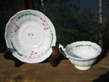 ANTIQUE HAND PAINTED TEACUP AND SAUCER picture