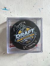Autographed puck with COA Matthew Tkachuk picture