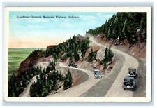 c1920s Car Passing Broadmoor-Cheyenne Mountain Highway Colorado CO Postcard picture