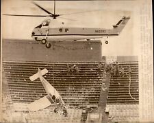 LD278 '76 Wire Photo FIREMEN HELICOPTER REMOVES PLANE WRECKAGE BALTIMORE STADIUM picture