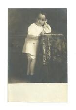 Antique Postcard Real Photo RPPC Child Leaning Against Pedestal picture