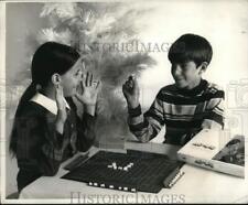 1970 Press Photo Toys - The Ad-Lib crossword game, played by youngsters picture