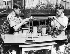 Ex-sailor Eric Harrod, , working on his model HMS Probisher, ship - 1930s Photo picture
