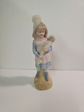 Vintage Large Bisque Porcelain Little Girl holding Doll Figurine picture