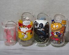 4pc Vintage Pop Culture Themed Drinking Glasses from 1953, 1971, 1976, & 1977 picture