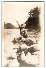 c1920's Candid Boy Child Clyde River Wave Smile RPPC Photo Unposted Postcard picture