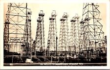 Real Photo Postcard Oil Wells in Downtown Kilgore, Texas picture