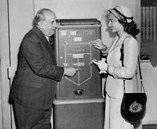Postmaster Albert Goldman and Ann Blyth buy stamps from new stamp  .. Old Photo picture