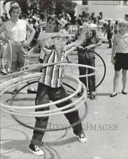 1958 Press Photo Richard Schafer with hula hoops in Jordan Marsh parking lot picture