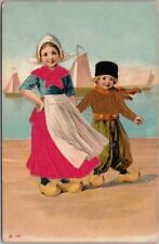 c1910s Dutch Boy & Girl Embossed Greetings Postcard Real Silk Cloth / Unused picture