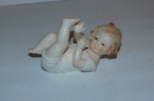 NICE PIANO BABY GIRL PLAYING WITH HER FEET FIGURINE MARKED U-5649 picture