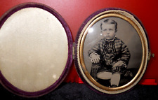 1/9th Size Tintype of young boy in pushbutton oval case picture