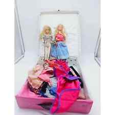 Vintage barbie case with two barbies and clothes picture